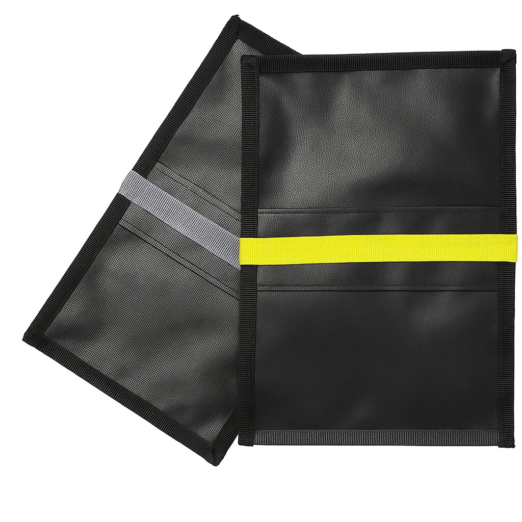 Black RIGR sandbag pair with yellow and grey straps displayed on a white background.