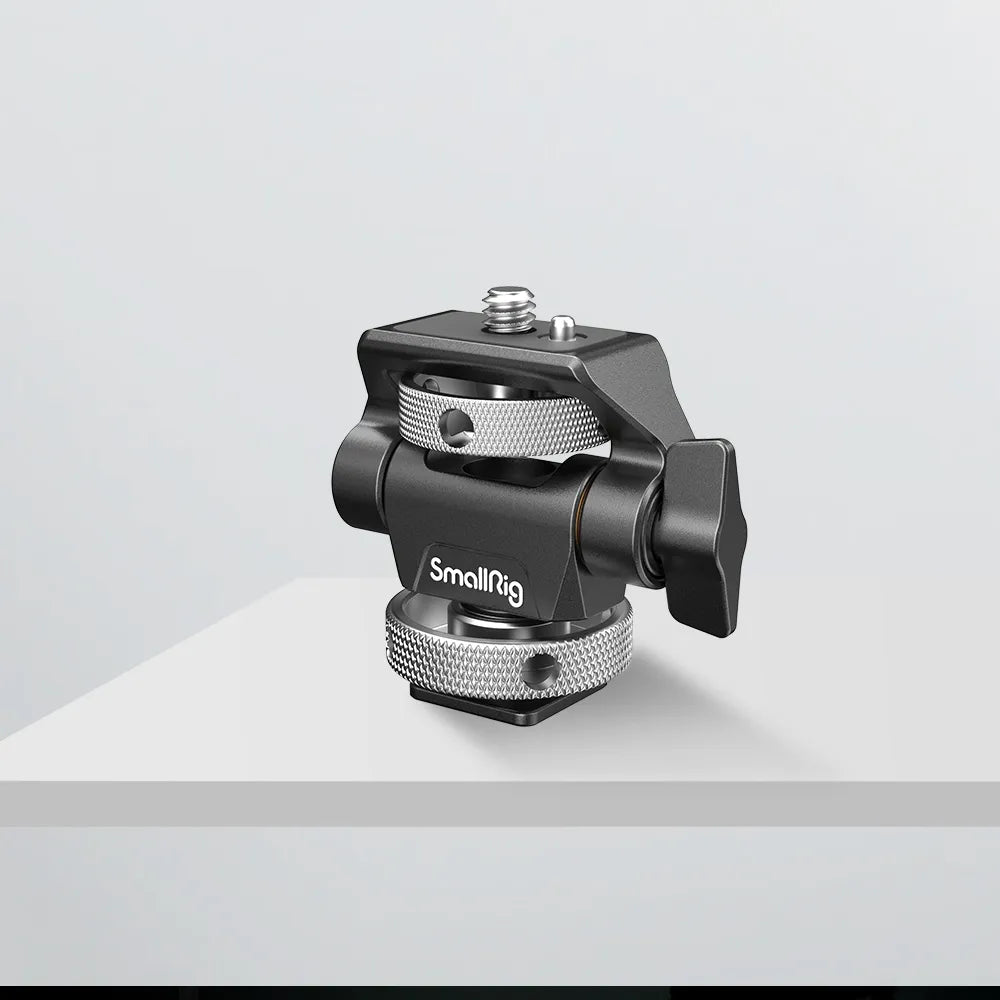 SmallRig Swivel and Tilt Adjustable Monitor Mount with Cold Shoe displayed on a white table, showcasing its full compact form.
