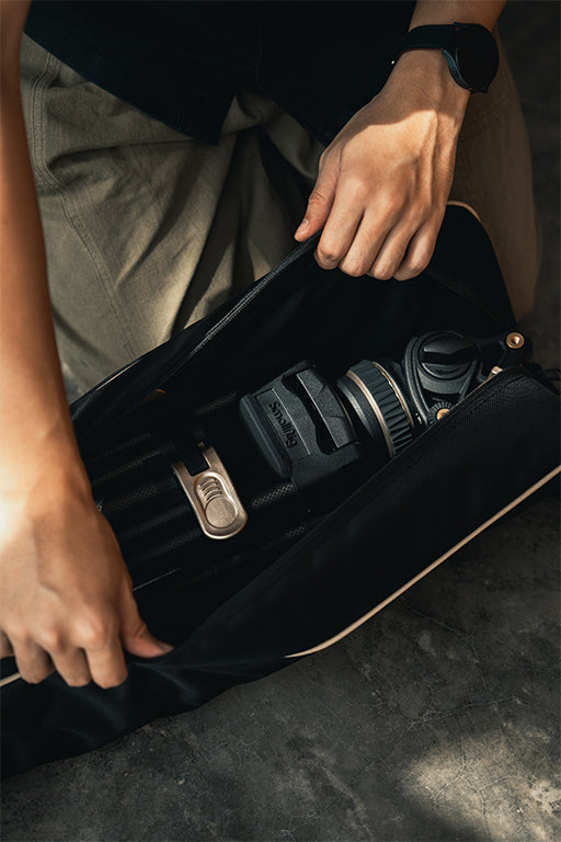 Image of tripod in bag serving as an image banner for the Who are we section on the about page