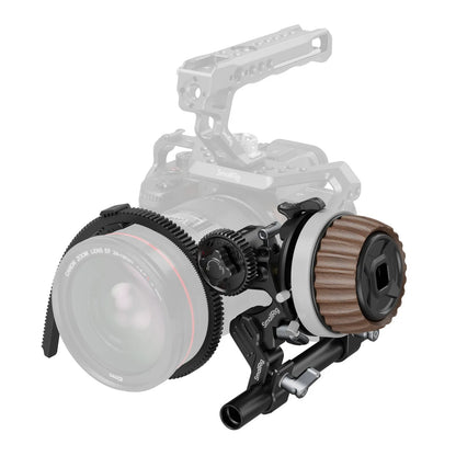 Follow Focus F60 attached to a rigged camera setup using 15mm rod support system.