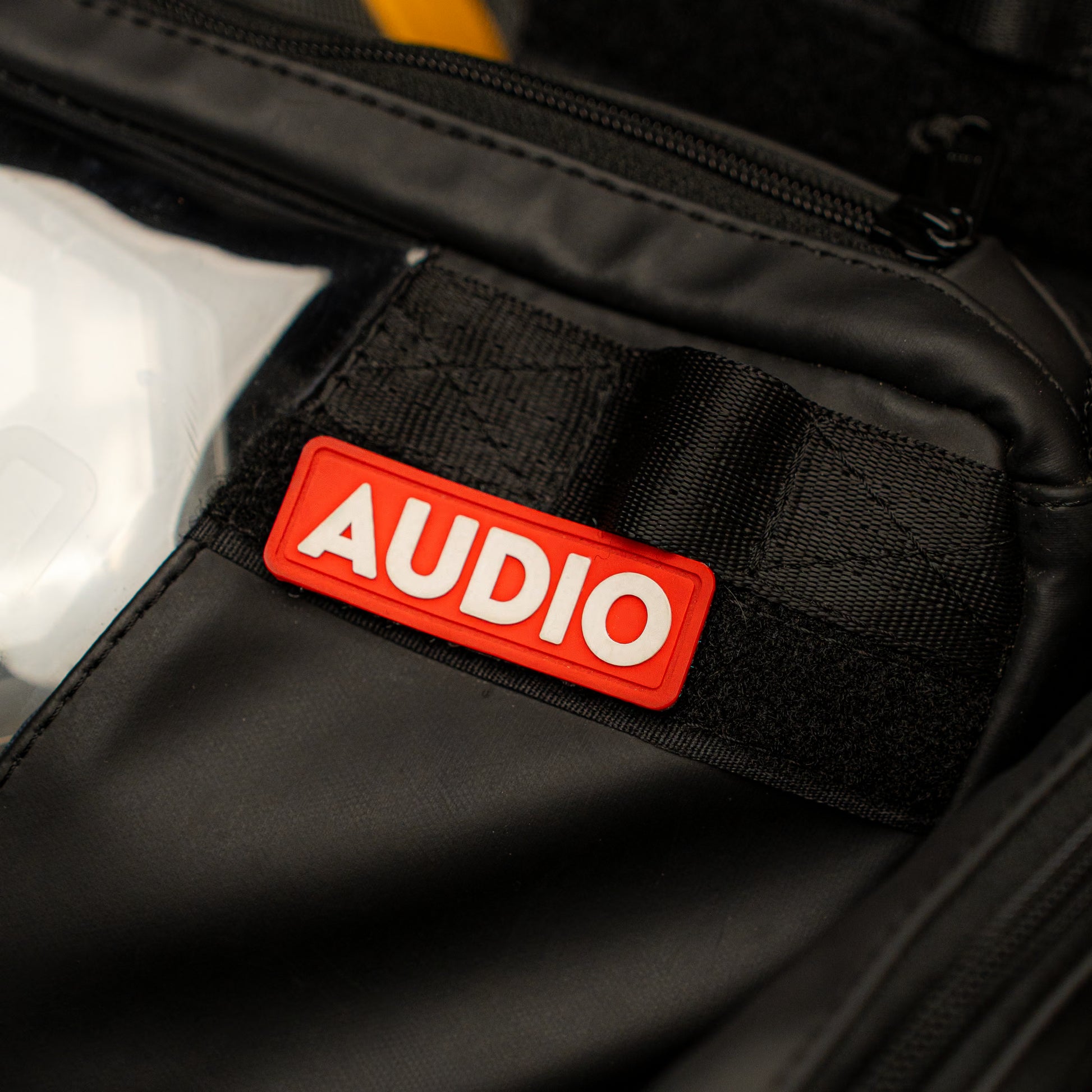 RIGR StakPak showing the velcro section with an organizer tag attached