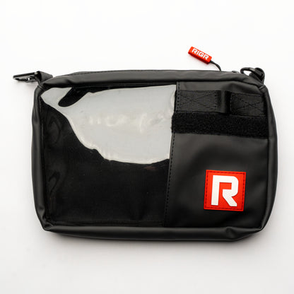 RIGR StakPak black organiser pouch with clear front panel, displayed upright with zipper closure.