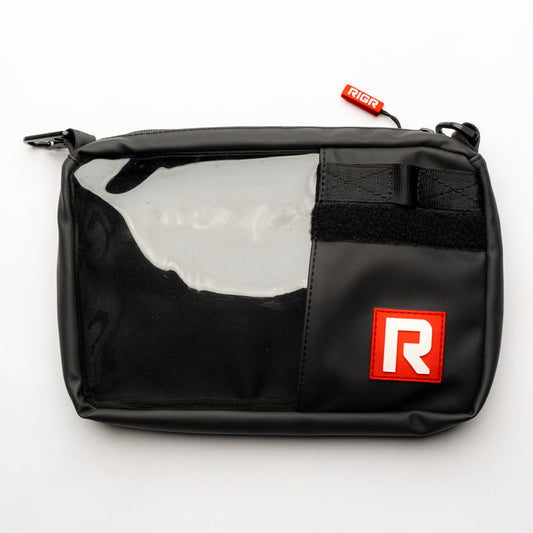 RIGR StakPak black organiser pouch with clear front panel, displayed upright with zipper closure.