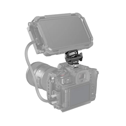 SmallRig monitor mount supporting a field monitor on top of a DSLR camera rig in professional setup.