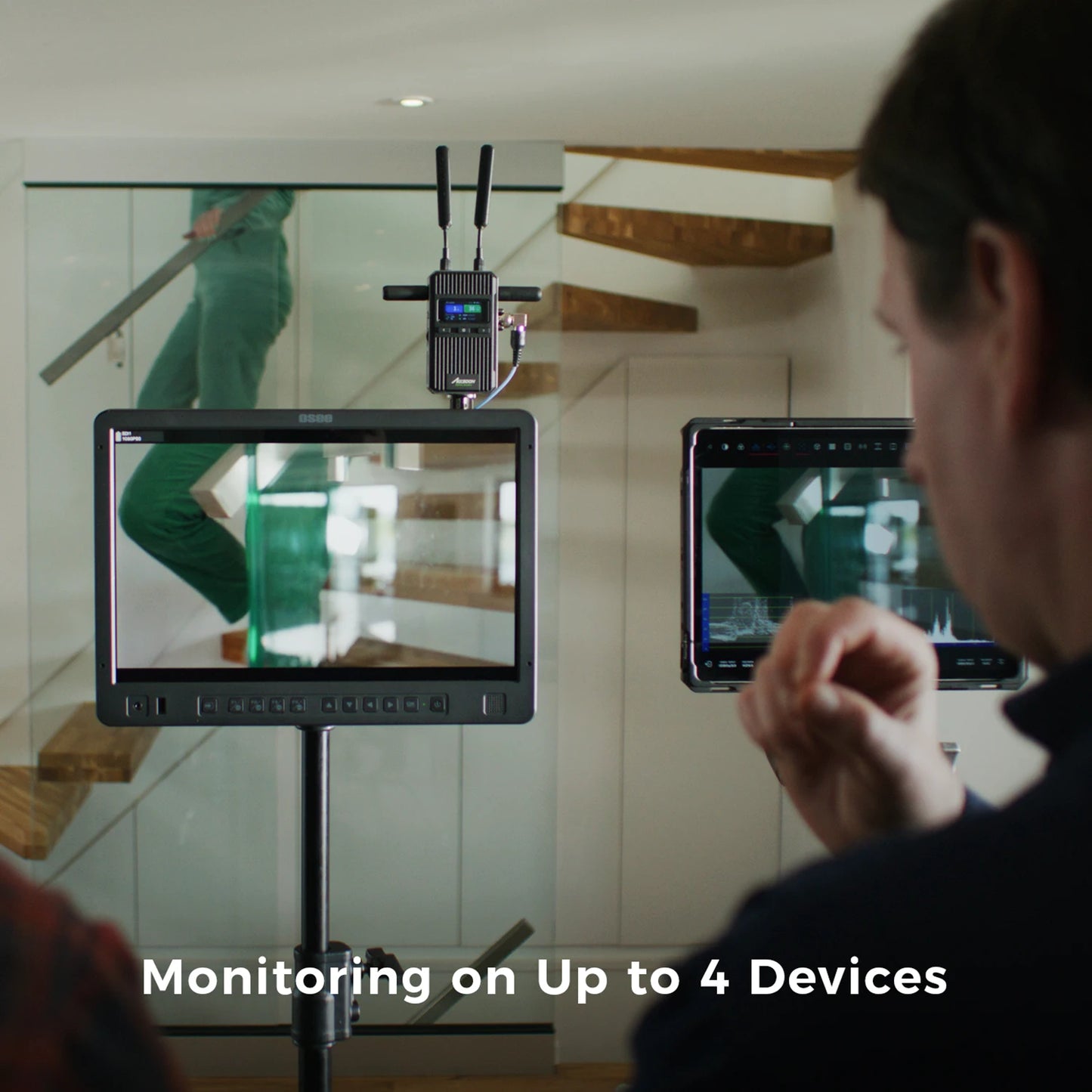 Accsoon wireless video transmission system connected to multiple monitors and tablet devices supporting monitoring on up to four devices simultaneously