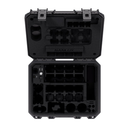 Open case top view showing custom foam interior layout with empty compartments for lights, lenses, and accessories in the upper tray.