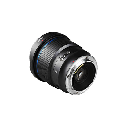 Laowa 10mm shown from rear angle exposing mount contacts, electrical connector pins visible.