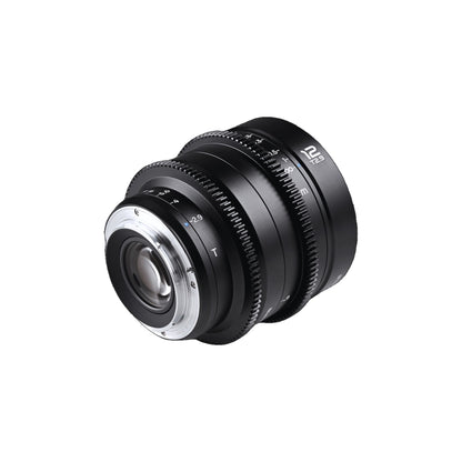 Laowa 12mm T2.9 Lite Zero-D lens in three-quarter perspective showing the rear mount assembly, control rings, and side profile against white background.