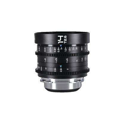 Laowa 14mm T2.6 Zero-D lens positioned vertically against white background showing full barrel, focus and iris rings, and silver mount.