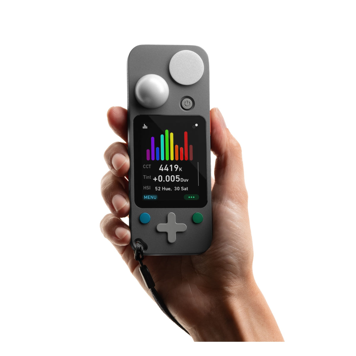 Hand holding Lit Duo 1 displaying colorful spectrum graph with CCT 4419k reading and color tint data on touchscreen.