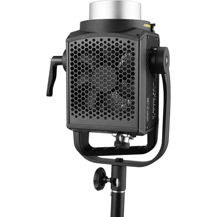 Rear view of the Nanlite Forza 300B II bi-colour LED spotlight showing its honeycomb ventilation grille and tilt yoke mount on a light stand.