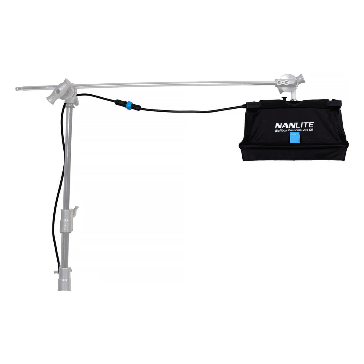 PavoSlim 120B mounted on horizontal boom with sandbag weight bag visible, three-quarter overhead view showing rigging and counterbalance setup.