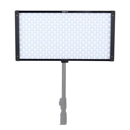 PavoSlim 120C mounted on stand with warm white and amber LEDs illuminated across the full panel.
