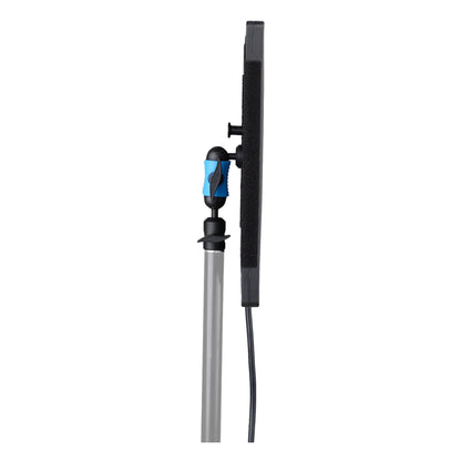 Side profile view of PavoSlim 120C showing the thin panel design, blue mounting knob with grip handle, and textured side grip, mounted on adjustable stand.