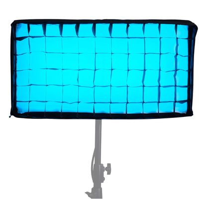 PavoSlim 120C equipped with snap-on diffusion softbox frame, emitting uniform cyan-blue light, mounted on stand.
