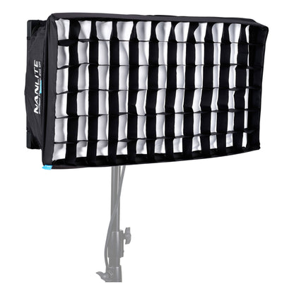 PavoSlim 120C equipped with snap-on egg-crate grid softbox showing white light output with internal grid structure visible.