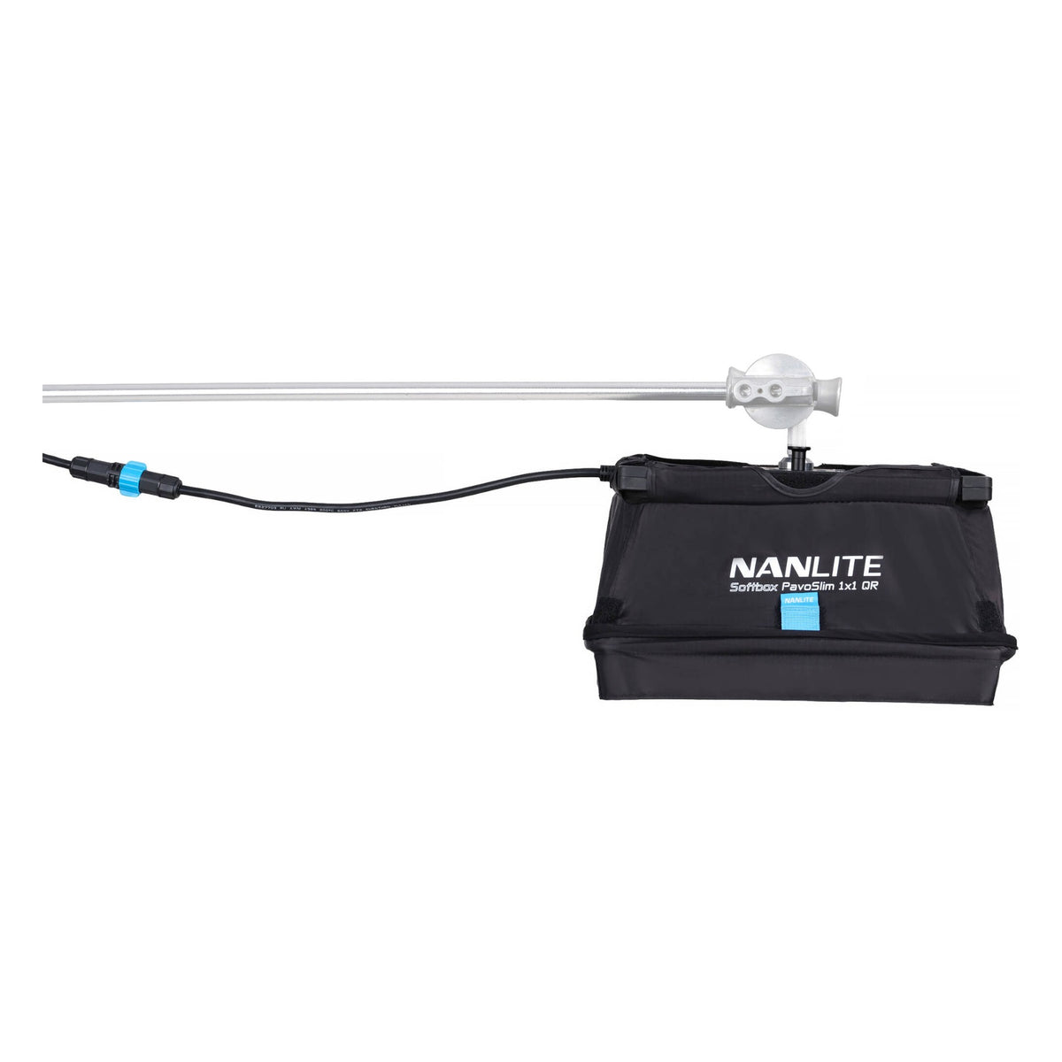 Low-angle side view of case-mounted light on boom arm showing, clamp hardware, and full cable run.