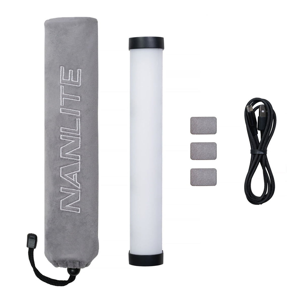 Complete package contents displayed: gray Nanlite carrying case, white tube, three gray magnets, and black coiled cable, all arranged flat.
