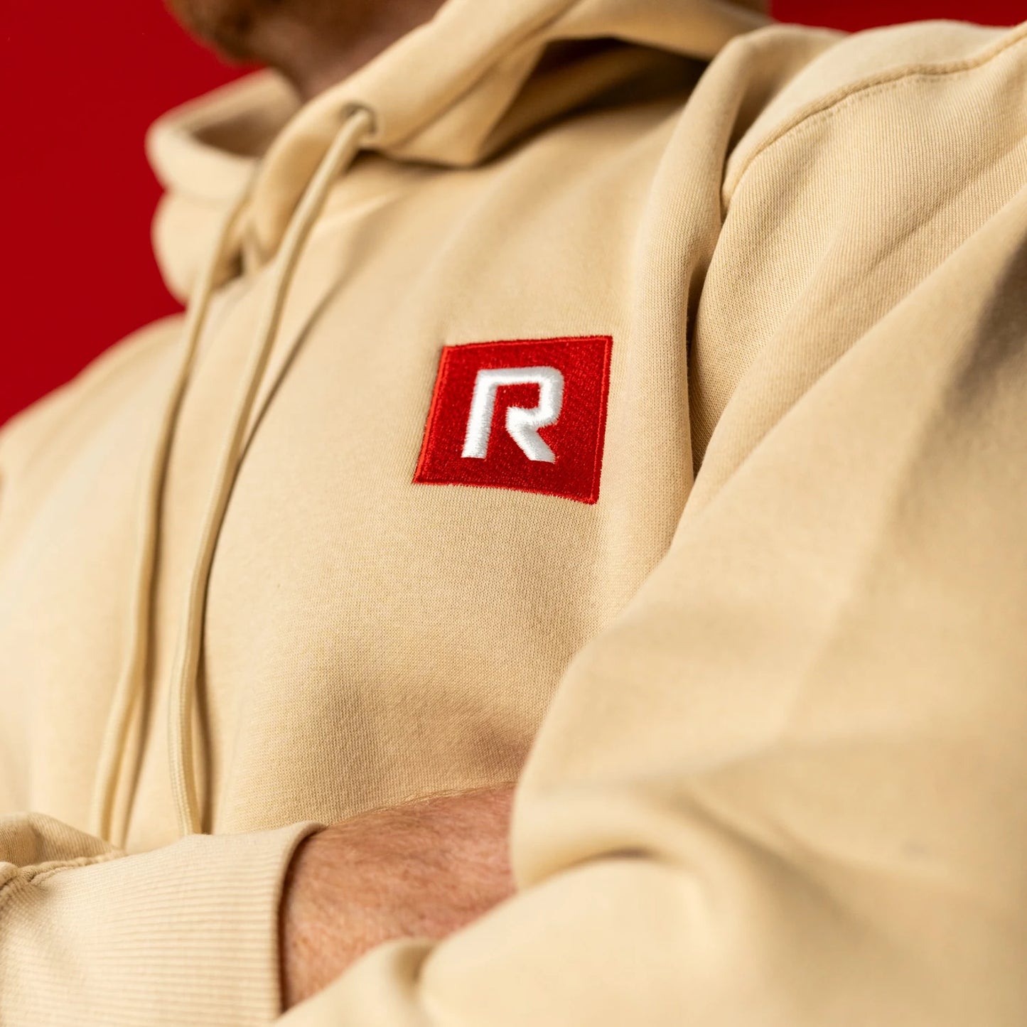 Embroidered RIGR logo on sand heavyweight hoodie